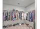 Organized walk-in closet with ample storage for clothing and shoes, perfect for any wardrobe at 132 Mcclellan Way, Summerville, SC 29483