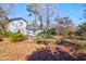 Exterior shot of the backyard featuring the home and landscape at 133 Stephanie Cir, Summerville, SC 29483
