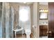 Small full bathroom featuring a toilet, vanity, and shower/tub combo at 133 Stephanie Cir, Summerville, SC 29483