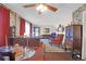 Open-concept living and dining area showcasing ample seating, a ceiling fan, and traditional décor at 133 Stephanie Cir, Summerville, SC 29483