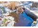 Unique backyard pond feature with stone accents and natural vegetation at 133 Stephanie Cir, Summerville, SC 29483