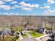 Aerial view of a neighborhood showcasing manicured lawns and mature trees, creating a picturesque setting at 135 Ashley Hill Dr, Goose Creek, SC 29445