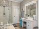 Bathroom featuring a glass shower, vanity with drawers, and decor elements at 135 Ashley Hill Dr, Goose Creek, SC 29445