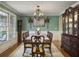 Elegant dining room featuring a large table, chandelier, and beautiful decor at 135 Ashley Hill Dr, Goose Creek, SC 29445