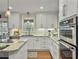 Well-equipped kitchen with stainless steel appliances, granite countertops, and ample cabinetry at 135 Ashley Hill Dr, Goose Creek, SC 29445