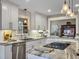 Updated kitchen with stainless steel appliances, granite countertops, and pass-through to the living room at 135 Ashley Hill Dr, Goose Creek, SC 29445