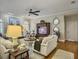 Spacious living room featuring hardwood floors, comfortable furniture, and stylish decor at 135 Ashley Hill Dr, Goose Creek, SC 29445