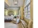 Spacious main bedroom featuring a sitting area, a trey ceiling, and a large arched window at 135 Ashley Hill Dr, Goose Creek, SC 29445