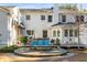 Charming outdoor space with a stone patio, comfortable seating, and a well-maintained deck for entertaining at 14 Guerard Rd, Charleston, SC 29407