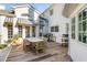 Inviting backyard with a spacious deck for outdoor dining and a grill, perfect for entertaining at 14 Guerard Rd, Charleston, SC 29407