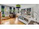 Stylized bedroom with decorative bed, fun bookshelf display, and a charming desk area at 14 Guerard Rd, Charleston, SC 29407