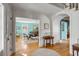 Open hallway showcasing the home's interior design, leading to the dining room with turquoise walls at 14 Guerard Rd, Charleston, SC 29407
