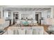 Bright and airy kitchen with a large island, white cabinetry, and stainless steel appliances at 14 Guerard Rd, Charleston, SC 29407