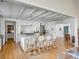 Spacious kitchen with a center island, white cabinetry, and seating for four at 14 Guerard Rd, Charleston, SC 29407