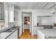 Beautiful bright kitchen featuring white cabinetry, subway tile backsplash, and stainless steel appliances at 14 Guerard Rd, Charleston, SC 29407