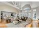 Spacious living room featuring high ceilings, neutral tones, and ample seating for entertaining at 14 Guerard Rd, Charleston, SC 29407