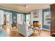 Spacious living room featuring a fireplace, hardwood floors, and a comfortable seating area at 14 Guerard Rd, Charleston, SC 29407