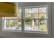 Window view of the spacious yard, perfect for outdoor relaxation, dining, and entertaining at 14 Guerard Rd, Charleston, SC 29407