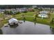 Aerial view of the community pool, clubhouse, lake, and boat house in a lovely planned neighborhood setting at 149 Calm Water Way, Summerville, SC 29486