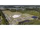 Aerial view of the Cane Bay YMCA facility showing baseball and soccer fields, tennis courts, and parking areas at 149 Calm Water Way, Summerville, SC 29486