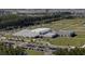 Aerial view of the YMCA's Cane Bay facility, complete with athletic fields, parking lots, and community buildings at 149 Calm Water Way, Summerville, SC 29486