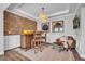 Inviting bar area features a rustic wooden bar with brick accent wall and seating at 149 Calm Water Way, Summerville, SC 29486