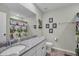 Bright bathroom featuring granite countertops and a fun monkey-themed shower curtain at 149 Calm Water Way, Summerville, SC 29486