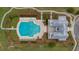 Aerial view of a resort style pool with clubhouse featuring lounge chairs and walkways providing relaxing spot at 149 Calm Water Way, Summerville, SC 29486