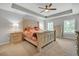 Spacious main bedroom with tray ceiling, neutral colors, and ample natural light at 149 Calm Water Way, Summerville, SC 29486