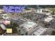Aerial view of 'The Market at Cane Bay' shopping center, featuring various restaurants and a Publix supermarket at 149 Calm Water Way, Summerville, SC 29486
