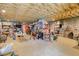 Spacious unfinished basement with exposed beams, great potential for customization at 17 Trumbo St, Charleston, SC 29401