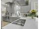 Modern kitchen with a gas range, stainless steel appliances, and a stylish design at 17 Trumbo St, Charleston, SC 29401