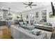 Open concept living room featuring hardwood floors, modern decor, and ample natural light at 17 Trumbo St, Charleston, SC 29401