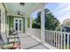 Inviting porch with views of the neighborhood and comfortable seating for relaxing outdoors at 17 Trumbo St, Charleston, SC 29401