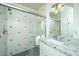 Beautiful bathroom featuring a glass shower door, granite countertops, and an elegant vanity at 186 N Shelmore Blvd, Mount Pleasant, SC 29464
