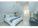 Charming bedroom with paneled walls, vaulted ceilings, and a window seat for added comfort at 186 N Shelmore Blvd, Mount Pleasant, SC 29464