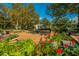 Beautiful community features lush landscaping, walkways, and a decorative fountain with benches at 186 N Shelmore Blvd, Mount Pleasant, SC 29464