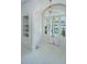 Bright entryway featuring white walls, arched doorway, and glass paneled door at 186 N Shelmore Blvd, Mount Pleasant, SC 29464