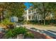 Charming two-story home with double porches, nestled among trees on Shipyard Road at 186 N Shelmore Blvd, Mount Pleasant, SC 29464