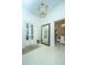 Open foyer boasts a statement mirror, light fixture, and double-door entry at 186 N Shelmore Blvd, Mount Pleasant, SC 29464