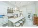 Well-lit kitchen with a large island, stainless steel appliances, and modern finishes at 186 N Shelmore Blvd, Mount Pleasant, SC 29464