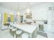 Gourmet kitchen with white cabinets, large island, and stainless steel appliances at 186 N Shelmore Blvd, Mount Pleasant, SC 29464