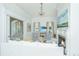 Bright living room features a fireplace, chandelier, comfortable seating, and a view through an arched doorway at 186 N Shelmore Blvd, Mount Pleasant, SC 29464