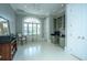 Bright office with built-in desk, shelving, light hardwood floors and access to private balcony at 186 N Shelmore Blvd, Mount Pleasant, SC 29464