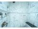 Luxurious shower features marble walls, a rainfall showerhead, and a built-in bench at 186 N Shelmore Blvd, Mount Pleasant, SC 29464