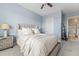 Cozy bedroom with soft lighting, a plush bed, and tasteful decor, creating a relaxing atmosphere at 200 River Landing Dr # 401A, Charleston, SC 29492