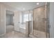 Bright bathroom with a tiled shower, a soaking tub, and clean lines for a refreshing experience at 208 Evergreen Ave, Summerville, SC 29485