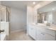 Elegant bathroom featuring double sinks, a tiled shower, and modern fixtures for a spa-like experience at 208 Evergreen Ave, Summerville, SC 29485
