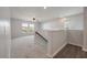 Upstairs bonus room featuring large windows and neutral carpet at 208 Evergreen Ave, Summerville, SC 29485