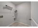 This is a basic utility room or closet with white walls, overhead wire shelving, and a tile floor at 208 Evergreen Ave, Summerville, SC 29485